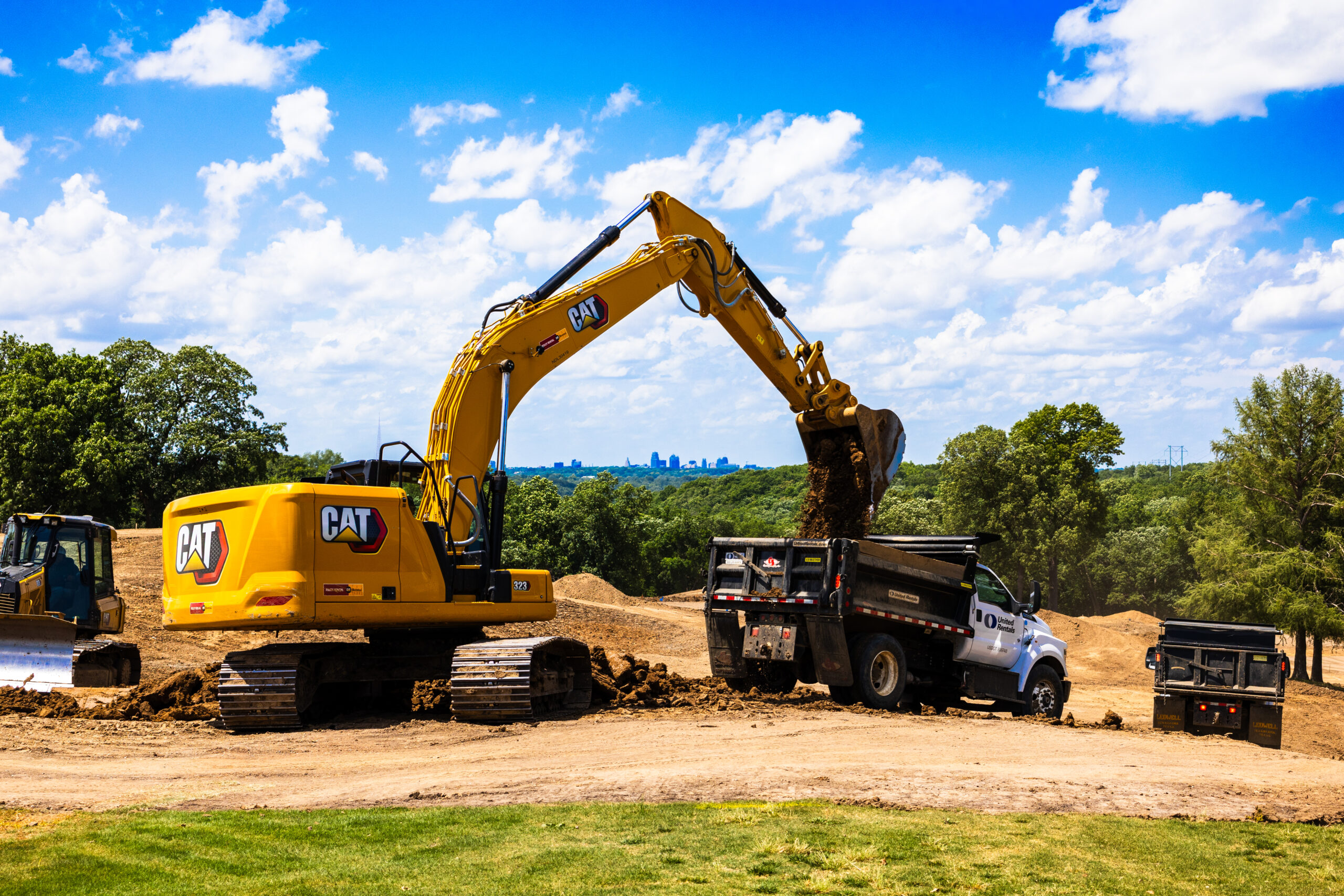 Heavy machinery shaping a new bunker complex